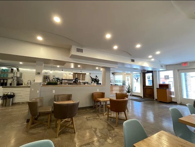 Bright seating area inside Commonwealth Coffee